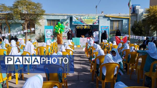 نواختن زنگ هفته کتاب و کتابخوانی در مدرسه شهید نجفیان