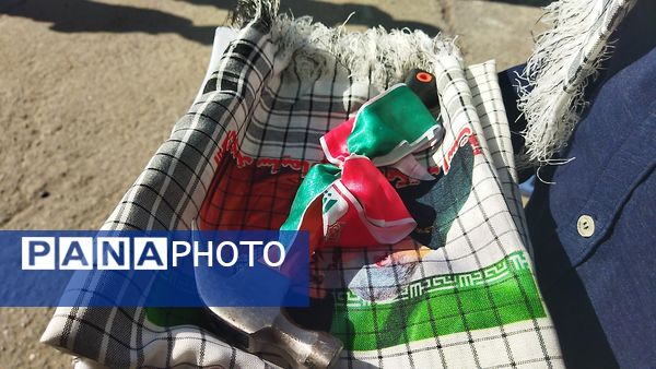 زنگ آغاز هفته بسیج  دانش آموزی در دبیرستان شاهد ابوذر غفاری نیشابور 