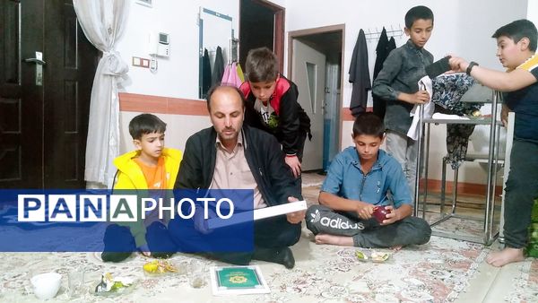 مراسم قرائت قرآن و تجلیل از مادر شهید در روستای بزنجرد خلیل آباد