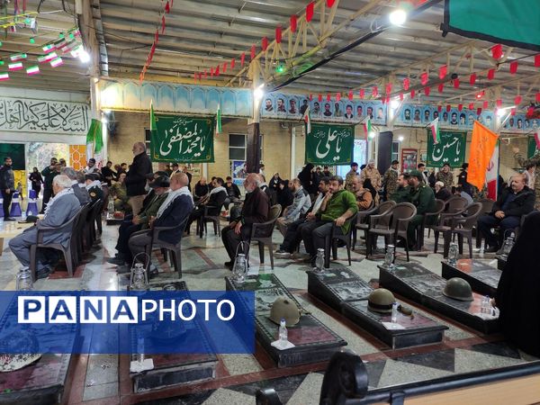 غبارروبی و گلباران مزار شهدای ملارد در رزمایش بزرگ بیت‌المقدس بسیجیان