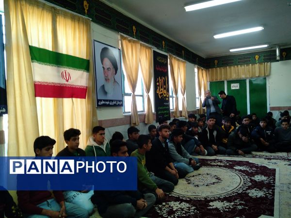 مراسم وداع با شهید گمنام در هنرستان کشاورزی شهید مطهری در شهرستان خلیل‌آباد