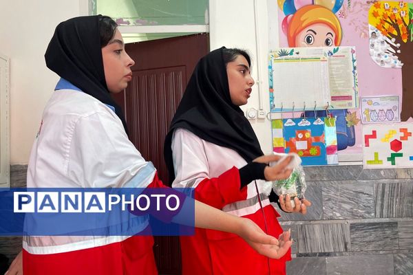 مانور تخلیه اضطراری و آمادگی برای لحظات بحرانی در مدرسه معراج بهارستان‌دو