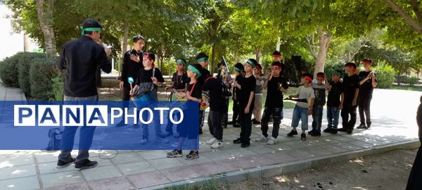 گردهمایی اعضای کانون پرورش فکری شماره 4 قم در جوار مزار شهید گمنام