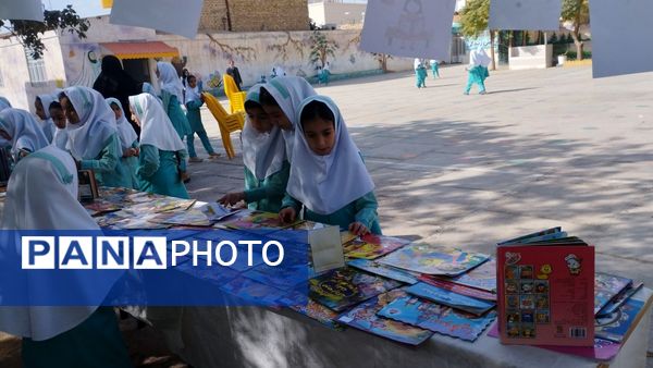 نواختن زنگ هفته کتاب و کتابخوانی در مدرسه شهید نجفیان