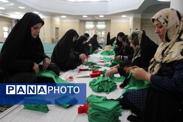 بسته‌بندی لباس همایش شیرخوارگان حسینی زنجان