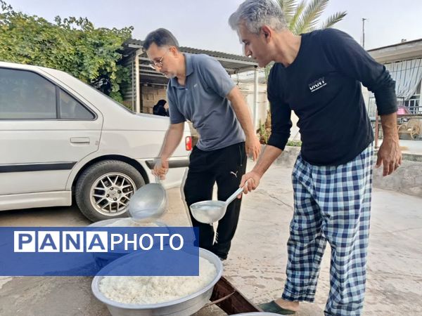پخت و توزیع نذری در روز تاسوعای حسینی روستای حسن آباد داراب استان فارس