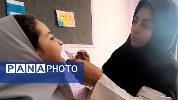اجرای طرح وارنیش فلوراید در دبستان پنجم مهر