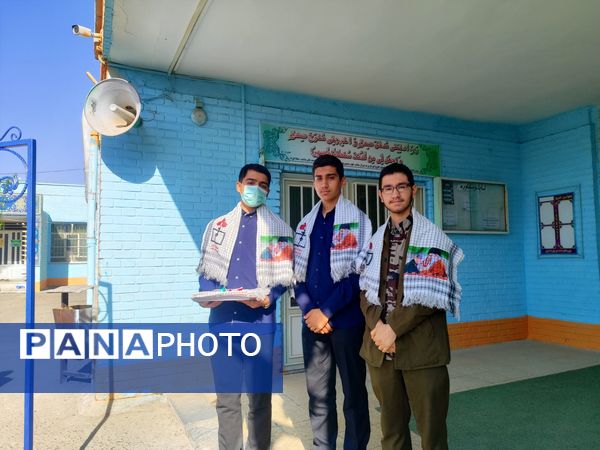 زنگ آغاز هفته بسیج  دانش آموزی در دبیرستان شاهد ابوذر غفاری نیشابور 