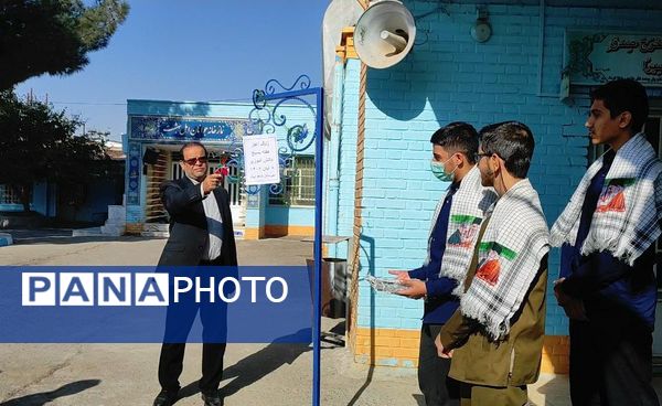 زنگ آغاز هفته بسیج  دانش آموزی در دبیرستان شاهد ابوذر غفاری نیشابور 