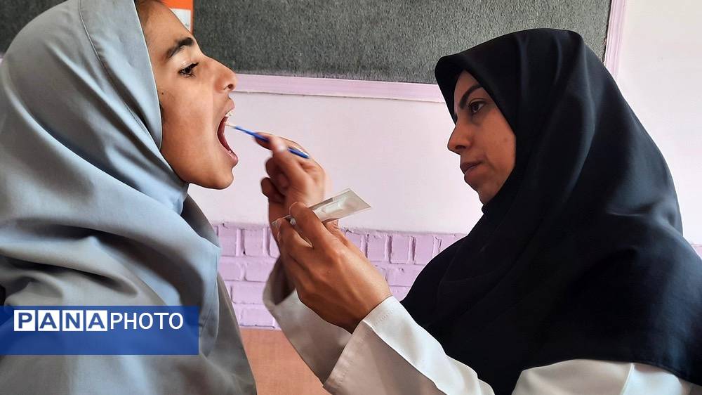 اجرای طرح وارنیش فلوراید در دبستان پنجم مهر