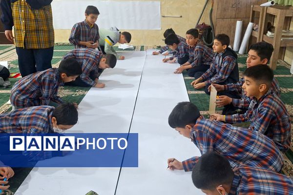 برپایی نقاشی همگانی در هفته ماها در آموزشگاه معارف۶ ناحیه ۳شیراز 