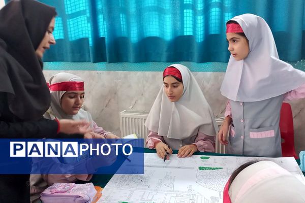 نمایش جلوه‌های ارادت فاطمی در روزنامه‌دیواری‌های مدرسه شهیدسرافراز اسلامشهر