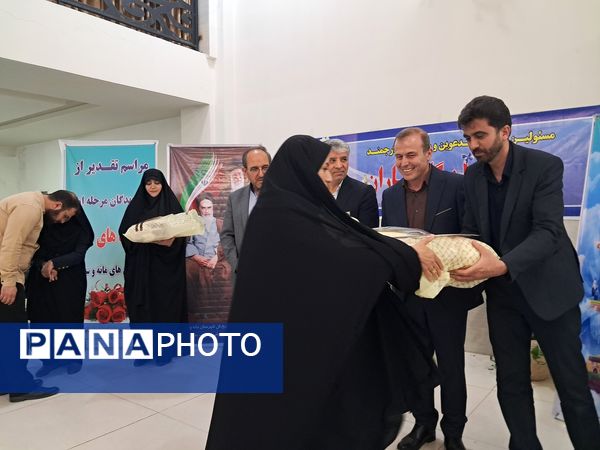 تجلیل از مربیان و معلمان پرورشی و خانواده شهدا در آشخانه