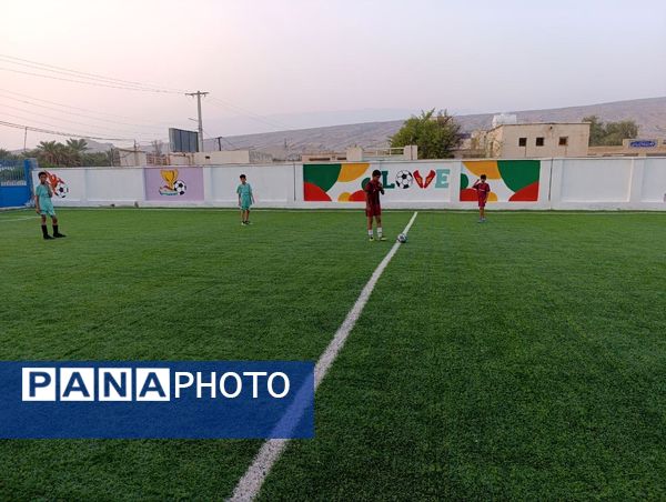 افتتاح زمین چمن مصنوعی آموزشگاه شهید مطهری مارم در فین