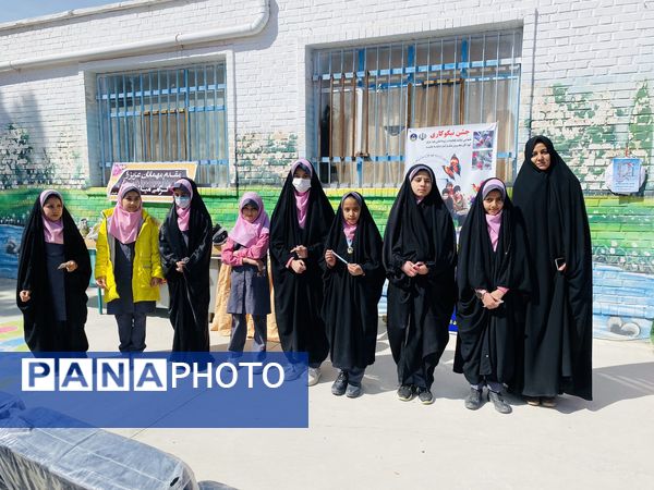 نواختن زنگ جشن نیکوکاری در دبستان زینب قهرمانی مه ولات