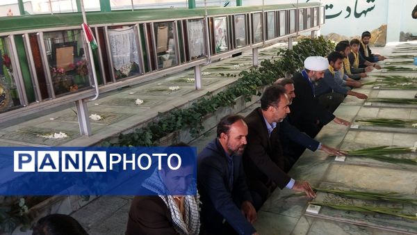 مراسم غبارروبی و عطرافشانی مزار شهدای 400 دستگاه ناحیه 3 کرج در هفته دفاع مقدس