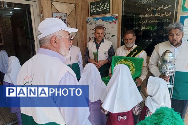 مراسم  پرچم گردانی  بارگاه حضرت علی بن موسی‌الرضا (ع) در مدرسه باهنر ملارد به مناسبت دهه کرامت