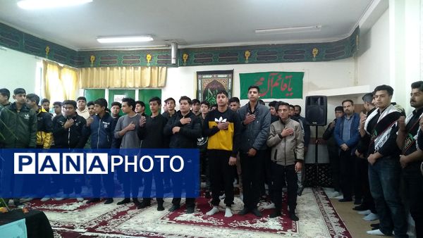 مراسم وداع با شهید گمنام در هنرستان کشاورزی شهید مطهری در شهرستان خلیل‌آباد