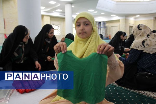 بسته‌بندی لباس همایش شیرخوارگان حسینی زنجان
