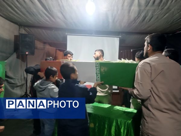 تشییع پیکر شهید گمنام در نمایشگاه یاس کبود 