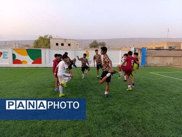 افتتاح زمین چمن مصنوعی آموزشگاه شهید مطهری مارم در فین