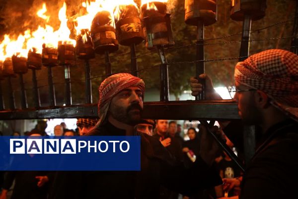 آیین «مشعل گردانی» نجفی‌های مقیم قم