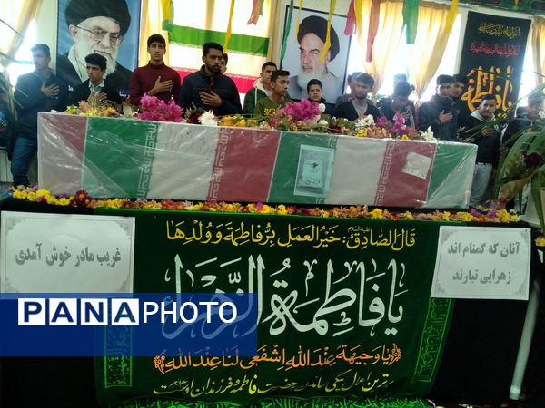 مراسم وداع با شهید گمنام در هنرستان کشاورزی شهید مطهری در شهرستان خلیل‌آباد