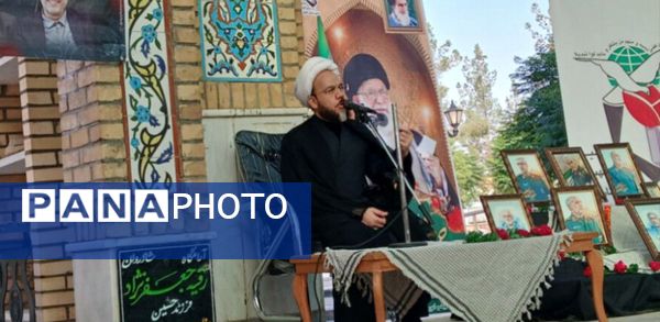  غبارروبی مزار شهدای شهرستان خلیل آباد