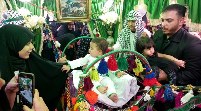 مراسم شیرخوارگان حضرت علی اصغر(ع) در مصلی نماز جمعه شهرستان فلاورجان
