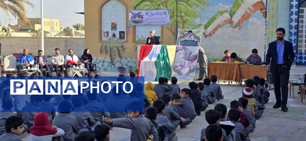 مراسم نمادین نواختن زنگ پدافند غیرعامل در دبستان شهید دهستانی بافق