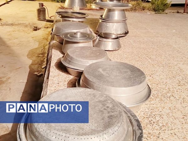 پخت و توزیع نذری در روز تاسوعای حسینی روستای حسن آباد داراب استان فارس
