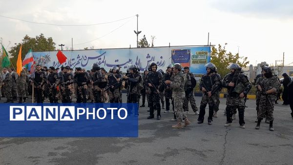 غبارروبی و گلباران مزار شهدای ملارد در رزمایش بزرگ بیت‌المقدس بسیجیان