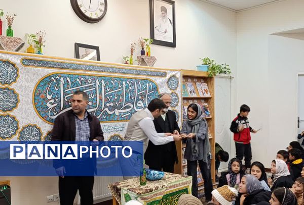 تقدیر از مادر شهید مهدی زاهدلویی در کتابخانه امام علی(ع) قم