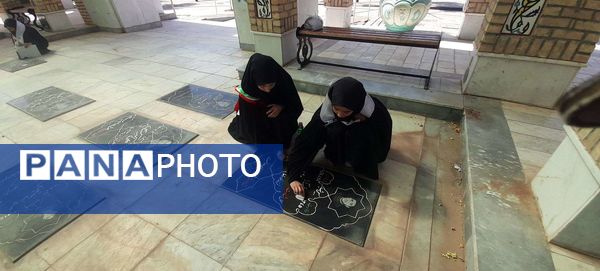 غبار روبی مزار شهدا شهرستان خلیل آباد توسط دانش آموزان بسیجی اموزشگاه مرحوم پاکدل 