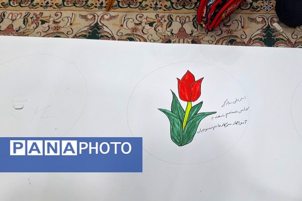 برپایی نقاشی همگانی در هفته ماها در آموزشگاه معارف۶ ناحیه ۳شیراز 