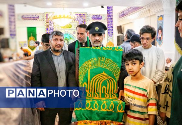 پرچم متبرک امام رضا (ع) در جشن ولادت امام رئوف در مسجد امام حسن عسکری (ع) بجنورد 