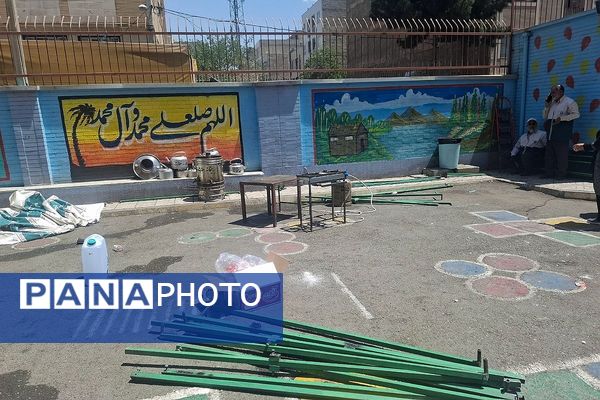مراسم  پرچم گردانی  بارگاه حضرت علی بن موسی‌الرضا (ع) در مدرسه باهنر ملارد به مناسبت دهه کرامت