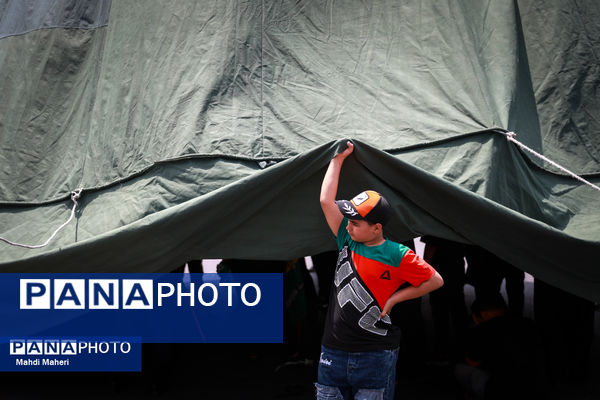 خیمه‌سوزان ظهر عاشورا در چهارراه گلوبندک تهران