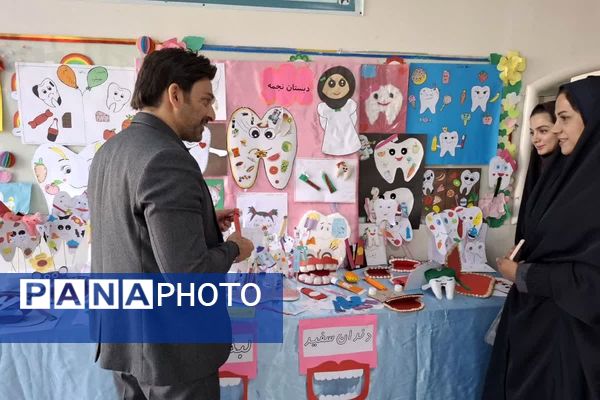 برگزاری طرح وارنیش فلوراید در مدرسه سمیه قرچک