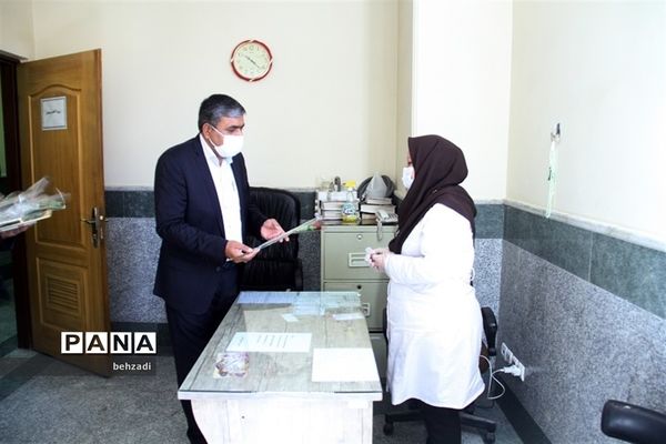 تجلیل از کادر کلینیک فرهنگیان