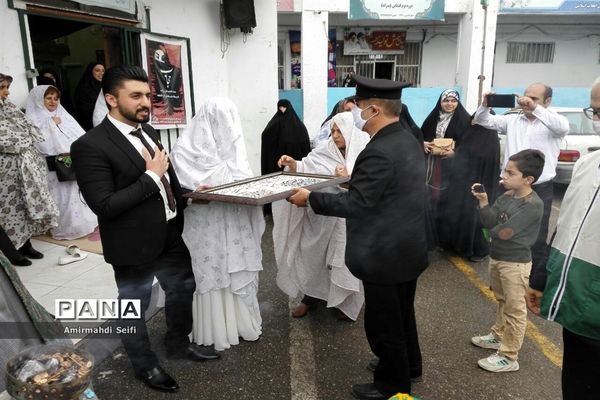 گرداندن پرچم مقدس آستان قدس رضوی در شهرستان محمودآباد