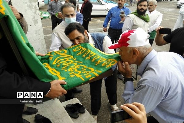 گرداندن پرچم مقدس آستان قدس رضوی در شهرستان محمودآباد