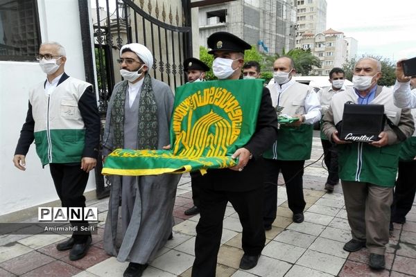 گرداندن پرچم مقدس آستان قدس رضوی در شهرستان محمودآباد