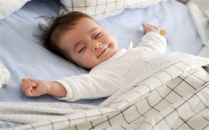 دلیل خندیدن نوزادان در خواب