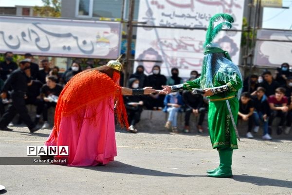 مراسم تعذیه خوانی  در میانه