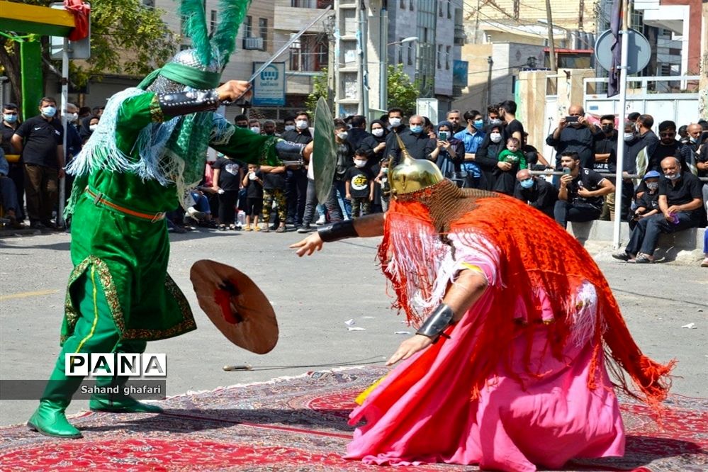 مراسم تعذیه خوانی  در میانه