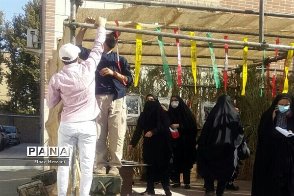 آماده‌سازی فضای آموزش و پرورش ملارد در هفته دفاع مقدس