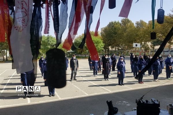 نواختن زنگ ایثار و شهادت در شهرستان ملارد