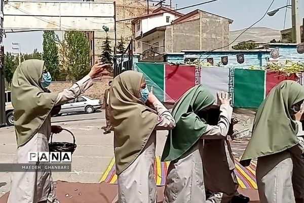 مراسم استقبال دانش‌آموزان از پیکر شهید گمنام در دبیرستان مسلم بن عوسجه  پردیس
