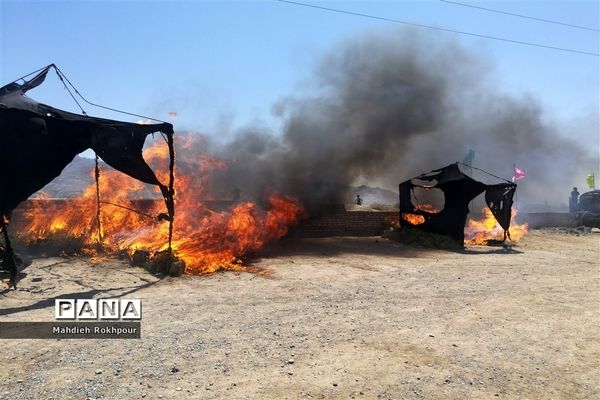 مراسم نمادین ظهر عاشورا در حاجی آباد بیرجند